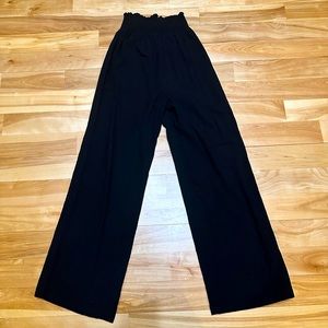 Shein relaxed beach flare pants, stretchy material, elastic high waist.